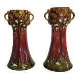 MINTON, A PAIR OF SECESSIONIST EARTHENWARE TUBELINED VASES BY JOHN WADSWORTH AND LEON SOLON, CIRCA