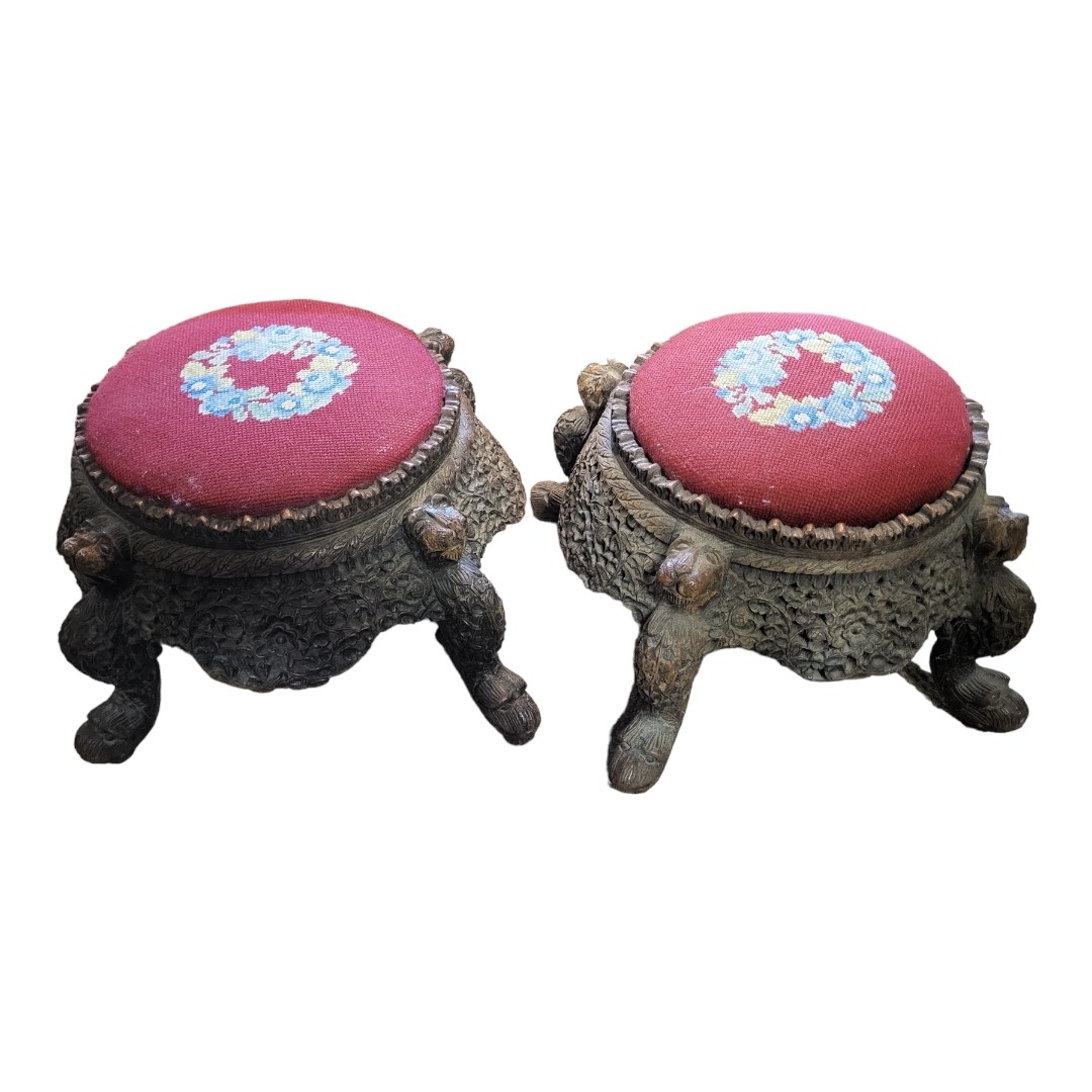 A PAIR OF LATE 19TH/EARLY 20TH CENTURY BURMESE CARVED WOODEN FOOTSTOOLS Circular form with inset