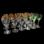 A SET OF TWELVE BOHEMIAN WINE GLASSES With gilded foliage rim decoration, together with a set of six