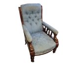 AN EDWARDIAN SOLID MAHOGANY EASY ARMCHAIR IN LATER PALE BLUE BUTTON BACK FABRIC UPHOLSTERY with