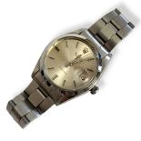 ROLEX, PRECISION, A VINTAGE STAINLESS STEEL GENT’S WRISTWATCH Having a silver tone dial with