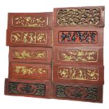 A SET OF TEN CHINESE EXPORT LATE 19TH CENTURY TIELI HARDWOOD RED LACQUER WOODEN PANELS Carved in