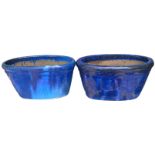 TWO PAIRS OF LARGE OVAL BLUE GLAZED STONEWARE GARDEN PLANTERS. (70cm x 40cm x 37cm) Condition: good