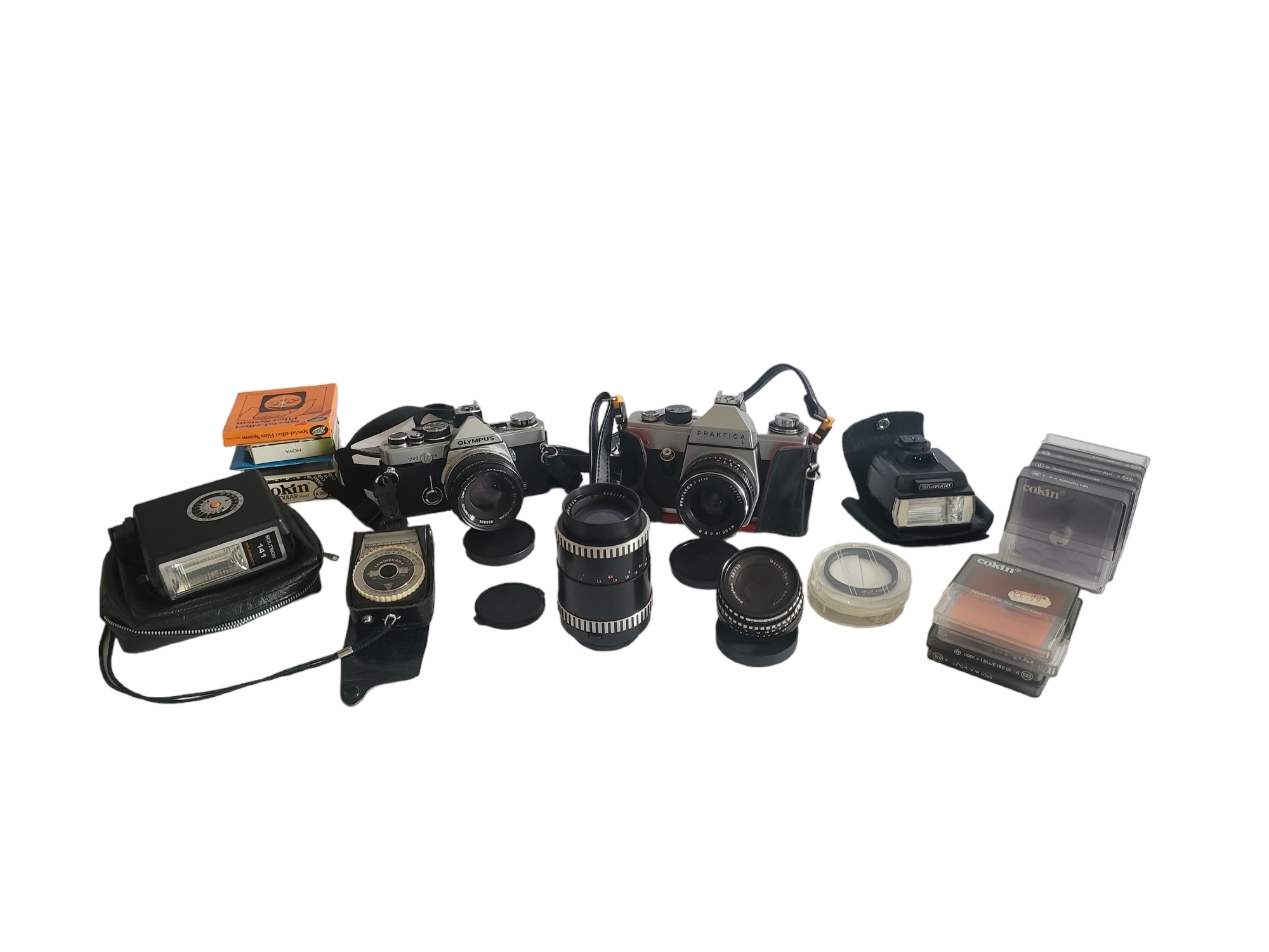 A COLLECTION OF VINTAGE CAMERAS and accessories to include Olympus, Praktika, lenses, etc.