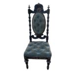 A VICTORIAN EBONISED AND BUTTON BACK GREEN VELVET UPHOLSTERED BEDROOM CHAIR Condition faded, some