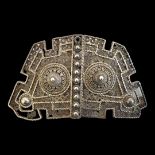 AN EARLY 20TH CENTURY PERSIAN FILIGREE WHITE METAL NURSES BUCKLE Set with dome form mounts and