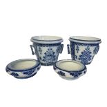 A PAIR OF VERY LATE 19TH CENTURY DUTCH MAASTRICHT FACTORY PORCELAIN BLUE AND WHITE BOUGH POTS, CIRCA