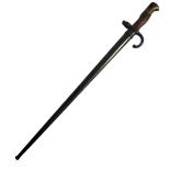 A LATE 19TH/EARLY 20TH CENTURY FRENCH BAYONET Having a mahogany and brass handle, steel blade and