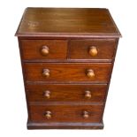 AN EDWARDIAN OAK MINIATURE CHEST Of two short above three drawers. (38cm x 29cm x 50cm) Condition: