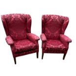 A PAIR OF 20TH CENTURY WING ARMCHAIRS Floral red cut damask square tapering legs. (76cm x 70cm x