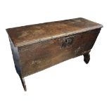 AN 18TH CENTURY SMALL OAK COFFER The rise and fall top, enclosing a candle box. Condition slightly