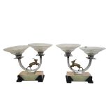 A PAIR OF ART DECO BRASS,CHROME AND FROSTED GLASS TABLE LAMPS Each having two concave glass shades