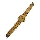 ROTARY, A VINTAGE GOLD PLATED GENTS WRISTWATCH Slim form with integral gold plated strap, in a