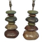 A PAIR OF MODERN DESIGN TABLE LAMP BASES both moulded with six graduated lustre stones-pebbles. sold