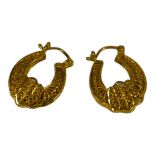 A VINTAGE PAIR OF YELLOW METAL FILIGREE EARRINGS Horseshoe form with pierced wirework. (approx 3cm x