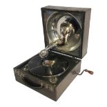 A 1920’S DECCA PORTABLE GRAMOPHONE MADE IN ENGLAND CHROME PLATED INTERIOR AND HORN DECCA WEDDELS