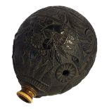 A FRENCH NAPOLEON III PERIOD CARVED COCONUT POWDER FLASK Carved with trophies, musical instruments