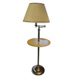 A BRASS STANDARD LAMP AND CREAM SHADE, with central faux marble central table shelf. Condition