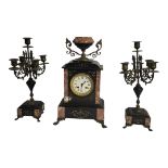 A LATE 19TH CENTURY FRENCH BLACK, ROUGE MARBLE AND GILT METAL MOUNTED CLOCK GARNITURE eight day,