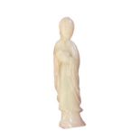 WITHDRAWN A CHINESE JADE FIGURE OF A STANDING DIETY Dressed in traditional attire and clutc