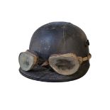 AN EARLY 20TH CENTURY MOTORCYCLE HELMET AND GOGGLES Condition good in accordance with age. 28 x 22cm