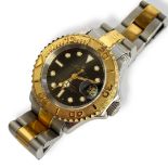 ROLEX, AN 18ct GOLD AND STAINLESS STEEL YACHT MASTER LADIES WRISTWATCH having a black dial marked '