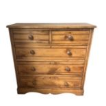 A LATE VICTORIAN PINE CHEST OF PINE CHEST of two short above three long drawers Condition some age