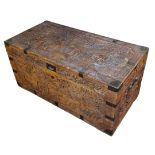 AN EARLY 20th CENTURY CAMPHOR WOOD CHEST rectangular form with brass mounts and handle and carved