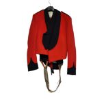 A BRITISH ROYAL ARTILLERY STAFF OFFICER'S MESS KIT The red jacket having gilt epaulettes, pips and