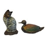 TWO CHILDRENS BEDROOM LAMPS Glass shades moulded in the shape of mallard duck and seated cat. Both