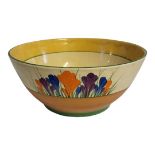 CLARICE CLIFF,AN ART DECO 'CROCUS' POTTERY BOWL hand painted flowers on yellow and brown ground.