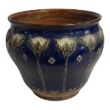 AN ART NOUVEAU ROYAL DOULTON STONEWARE JARDINAIRE having raised decoration of stylised flowers on