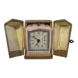 A FRENCH ART DECO BAYARD PINK BAKELITE CASED ALARM CLOCK A travelling ladies’ alarm clock in