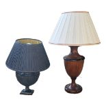 A SOLID MAHOGANY URN FORM TABLE LAMP, along with another metal table lamp, both in the regency