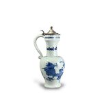 A Blue and White Silver mounted Ewer, Kangxi, of European silver form with baluster body rising to a