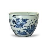 A blue and white birds and flowers Jardiniere, H: 17cm., staple repaired, ground mouth, black