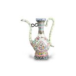 A Canton Enamel Ewer, Yongzheng/early Qianlong, of slender near Eastern metal form, finely enamelled