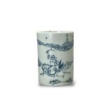 A blue and white brushpot, pencilled with an official riding on a horse, accompanied by two