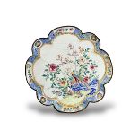 A Petal lobed Canton Enamel Tray, Yongzheng/early Qianlong, well enamelled with a pair of