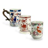 Three export porcelain mugs, 18th century, comprising a 'rouge de fer' mug with flowers, a Chinese