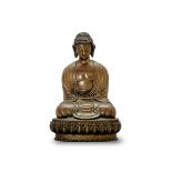 A Bronze seated Buddha, 18th/19th century, well cast with the serene figure seated on a lotus plinth