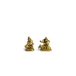 Two miniature Gilt Bronze seated Bodhisattvas, c.1800, one seated on an elephant, W: 4cm.,fair