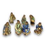 Six charming miniature Shiwan Figures, Republic period or earlier, comprising two standing