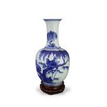 A Blue and White Bottle Vase, 18th/19th century, the ovoid body well painted in inky tones of cobalt
