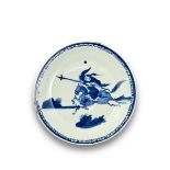 A blue and white 'rider' Dish, probably 17th century, with a lively central scene of a rider with