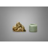 A Soapstone Lohan, and a Jadeite Archer's Ring, Qing dynasty, the soapstone well carved with the