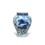 A blue and white jar with dragons, in Transitional style, the baluster body painted with dragons and