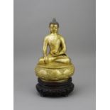 A Fine Zanabazar school Gilt Bronze Buddha, 18th century, the serene figure finely cast and