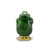 A Spinach Jade swing handled Vase and Cover, you, Qing dynasty, four character incised Qianlong