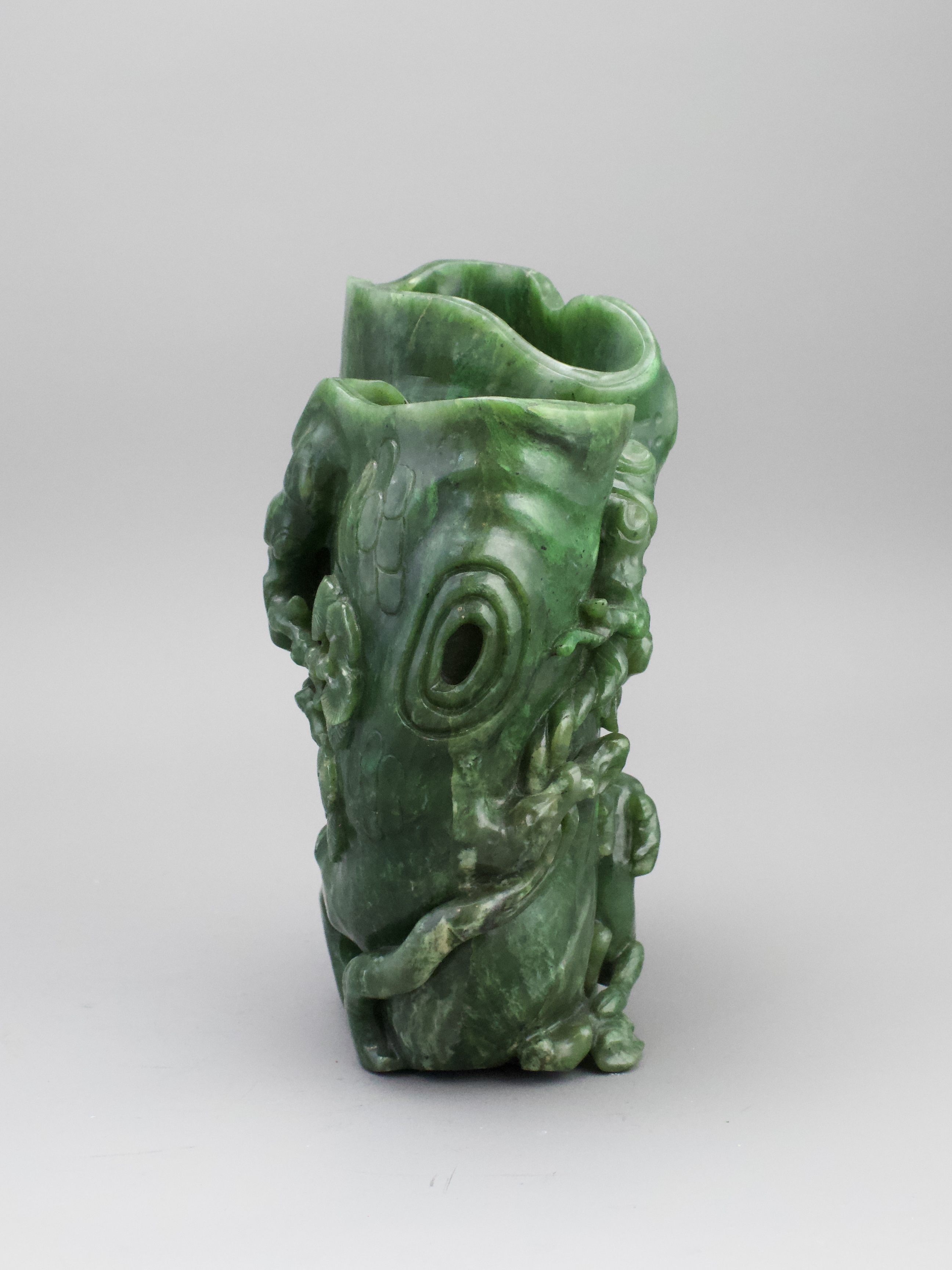 A spinach Jade 'deer and pine' Vase, 18th century, finely carved from the dark speckled stone in the - Image 7 of 7